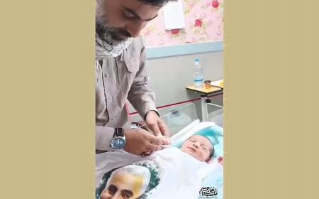 لحظاتی از دیدار شهید عباس محمد رعد با فرزندش + فیلم